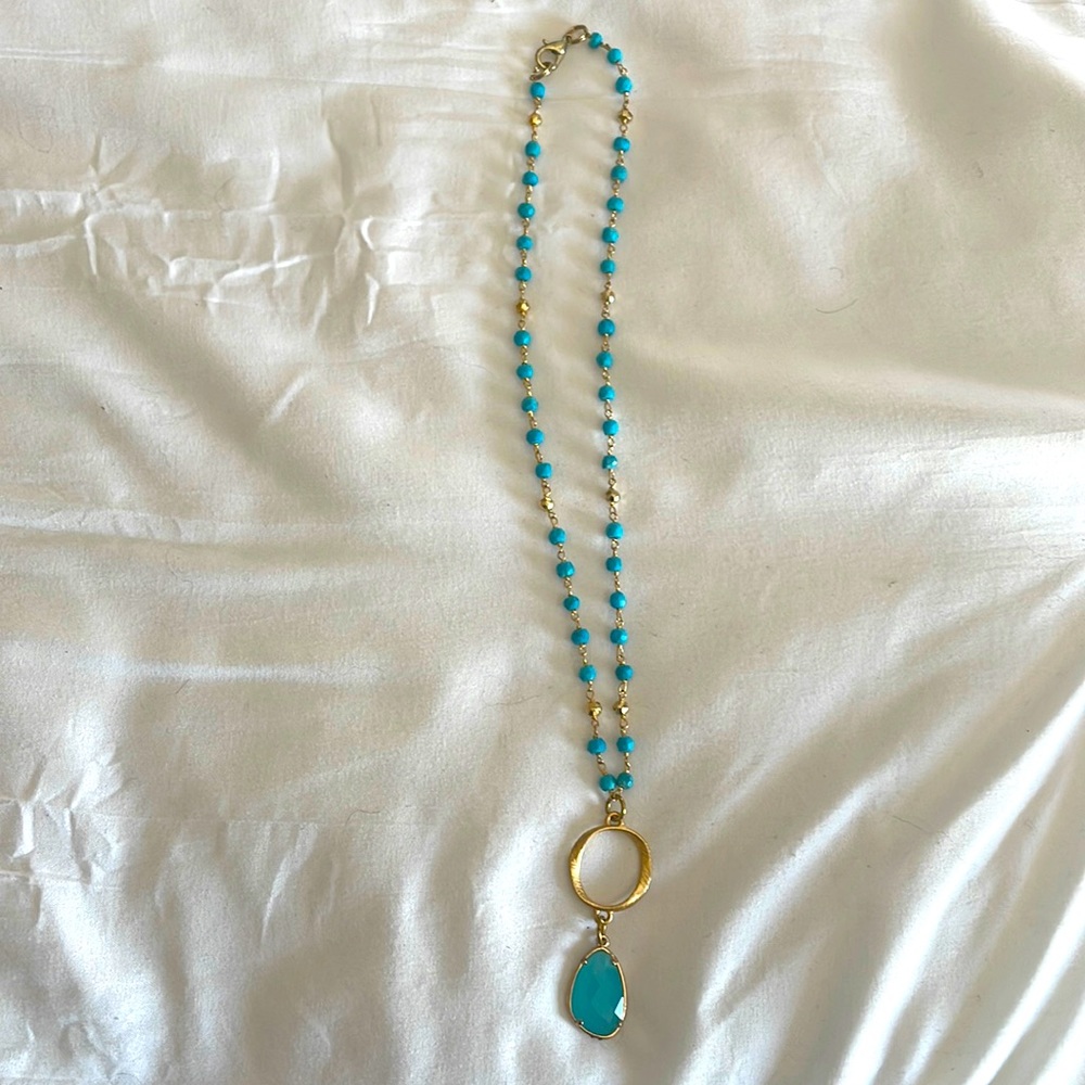 Turquoise/Blue & Gold Necklace with an turquoise blue stone. “New”. Never worn!